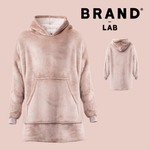 A dusty nude fleece hoodie with a soft sherpa lining, shown in a large front view and a smaller side/back view on a solid pink background, with the text 'BRAND LAB' at the top right.