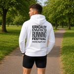 A man standing on a park path wearing a white hoodie from the back, which features the text 'KIRKCALDY PARKS RUNNING FESTIVAL'