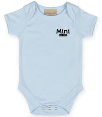 Light Blue baby onesie with short sleeves, featuring the text 'Mini Est. 2021' in Black on the left chest area and snap closures at the bottom.