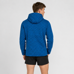A man wearing a heathered blue hooded sweatshirt and black athletic shorts, shown from the back against a light grey studio background.