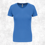 A women's short-sleeve crew-neck athletic t-shirt in a solid medium blue color, displayed on a textured light gray background.
