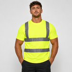 A man wearing a high-visibility neon yellow short-sleeve t-shirt with reflective gray horizontal and vertical stripes, paired with black pants, against a light gray studio background.