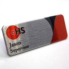 Business name badge printed with logo and staff name