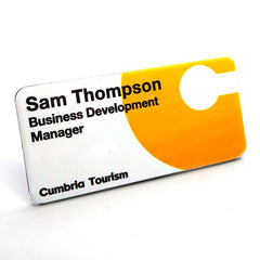 White staff name badge printed for tourism representative