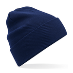 Navy knit beanie on a white background