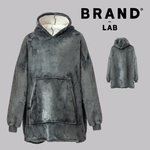 A dark grey tie-dye fleece hoodie with a sherpa-lined hood and kangaroo pocket, shown on a light grey background with the text 'BRAND LAB' and a smaller rear view inset.