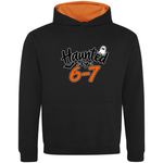 A black pullover hoodie with an orange hood lining and a front graphic that reads 'Haunted by 6-7' in white and orange, featuring a small ghost illustration.