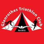A red square graphic with the text 'Glenrothes Triathlon Club' in white arching over a stylized black, white, and red tent. Silhouettes of a cyclist, swimmer, and runner are shown across the tent, with 'Est 2012' at the bottom.