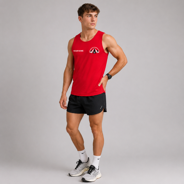 A man modeling a red sleeveless athletic tank top with a custom name print and logo on the chest, paired with black athletic shorts, white socks, and running shoes against a gray studio background.
