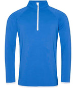 CoolFit matt finish performance fabric with superior wicking properties, UPF 40+ UV protection, slim fit, stand-up collar, raglan sleeves, zip neck with chin guard, self-fabric contrast bound zip, cuffs and hem, reflective tab on back of neck for earphones, tear-out label. In Royal Blue