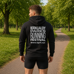 A man viewed from behind wearing a black hoodie with 'KIRKCALDY PARKS RUNNING FESTIVAL'