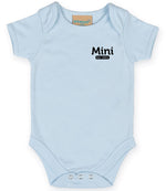 Light Blue baby onesie with short sleeves, featuring the text 'Mini Est. 2021' in Black on the left chest area and snap closures at the bottom.