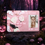 A pink Halloween-themed ID card styled as a 'Trick or Treating ID Card' for a 'Creature of the Forest' named Maisie, displayed on a forest floor with pumpkins and glowing mushrooms.