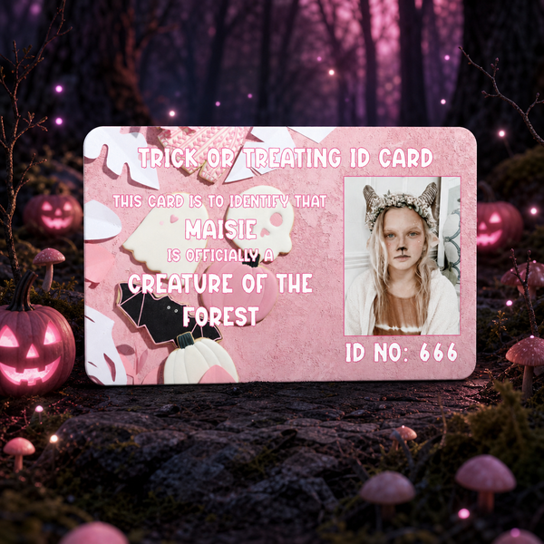A pink Halloween-themed ID card styled as a 'Trick or Treating ID Card' for a 'Creature of the Forest' named Maisie, displayed on a forest floor with pumpkins and glowing mushrooms.