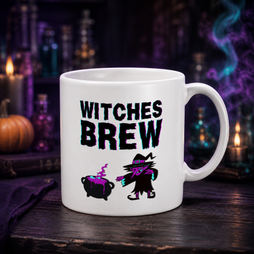 A white ceramic mug with a 'Witches Brew' graphic, set on a dark wooden table with a blurred Halloween-themed background of candles, bottles, and a pumpkin.