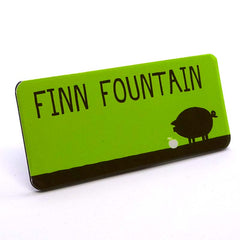 Name badge printed in green - includes logo and staff name